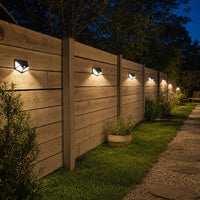 Foto de ambiente: Valla de madera de un jardín de noche